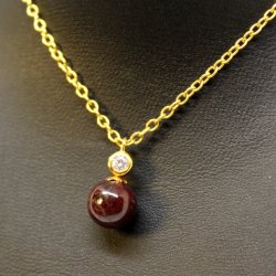 Rubin p guldkde med zirkon